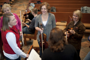 BSO musicians chat during a rehearsal break