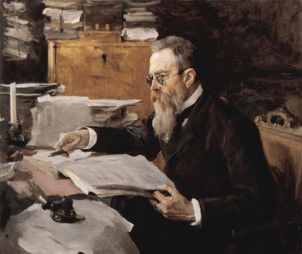 A painting of an older man with a long gray beard and glasses, who is sitting at a desk, looking at a large paper document